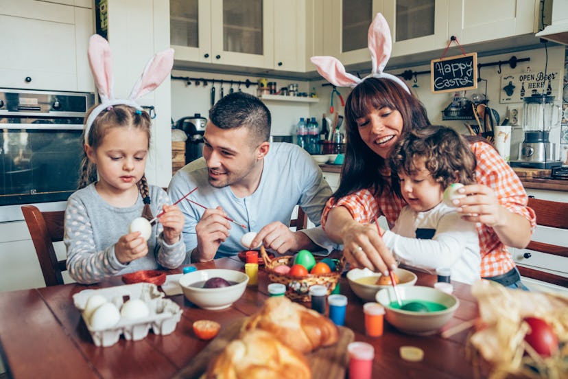 Lovely family prepare for Easter in an article of Easter Bunny ideas for parents