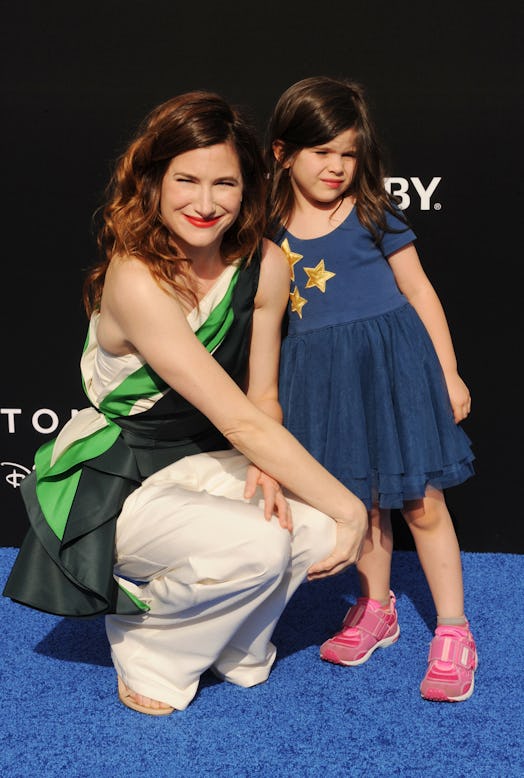 ANAHEIM, CA - MAY 09: Actress Kathryn Hahn (L) and daughter Mae Sandler attend Disney's 'Tomorrowlan...