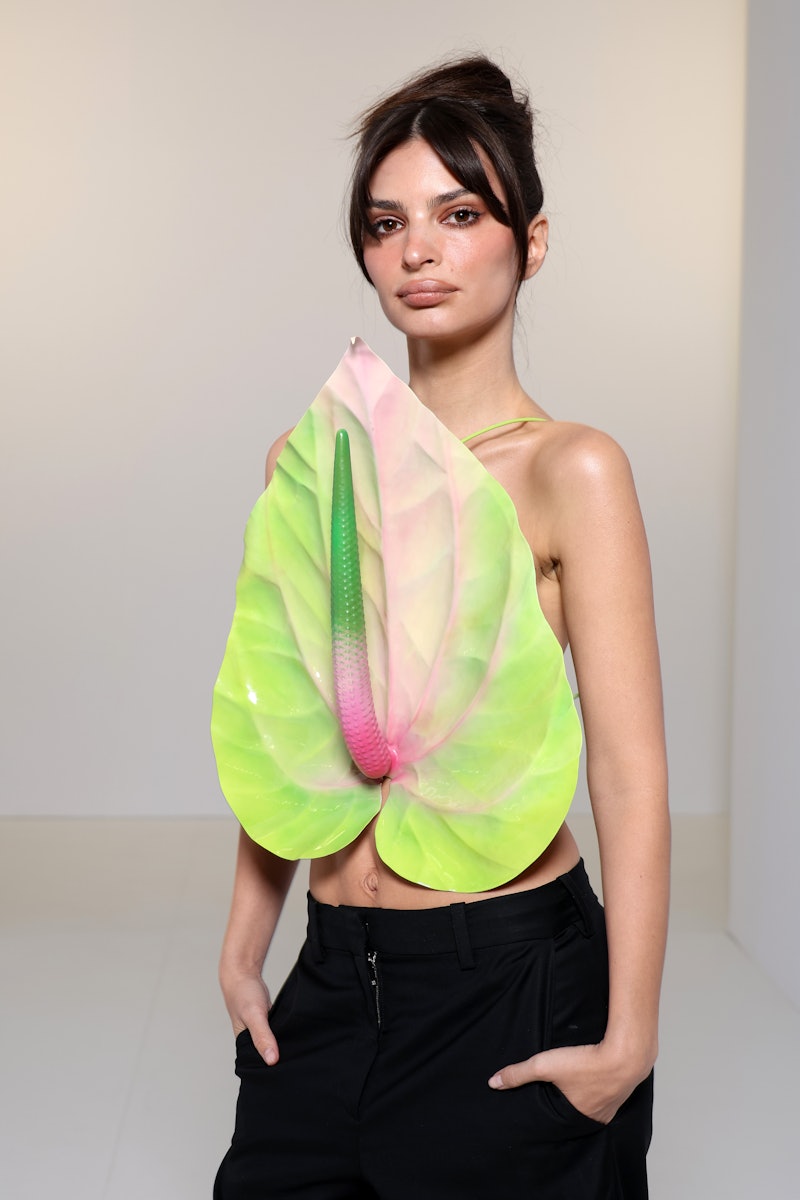 Emily Ratajkowski wore a giant anthurium flower during Paris Fashion Week. 