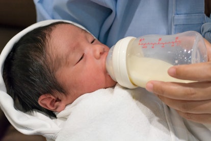 newborn drinking milk at maternity ward