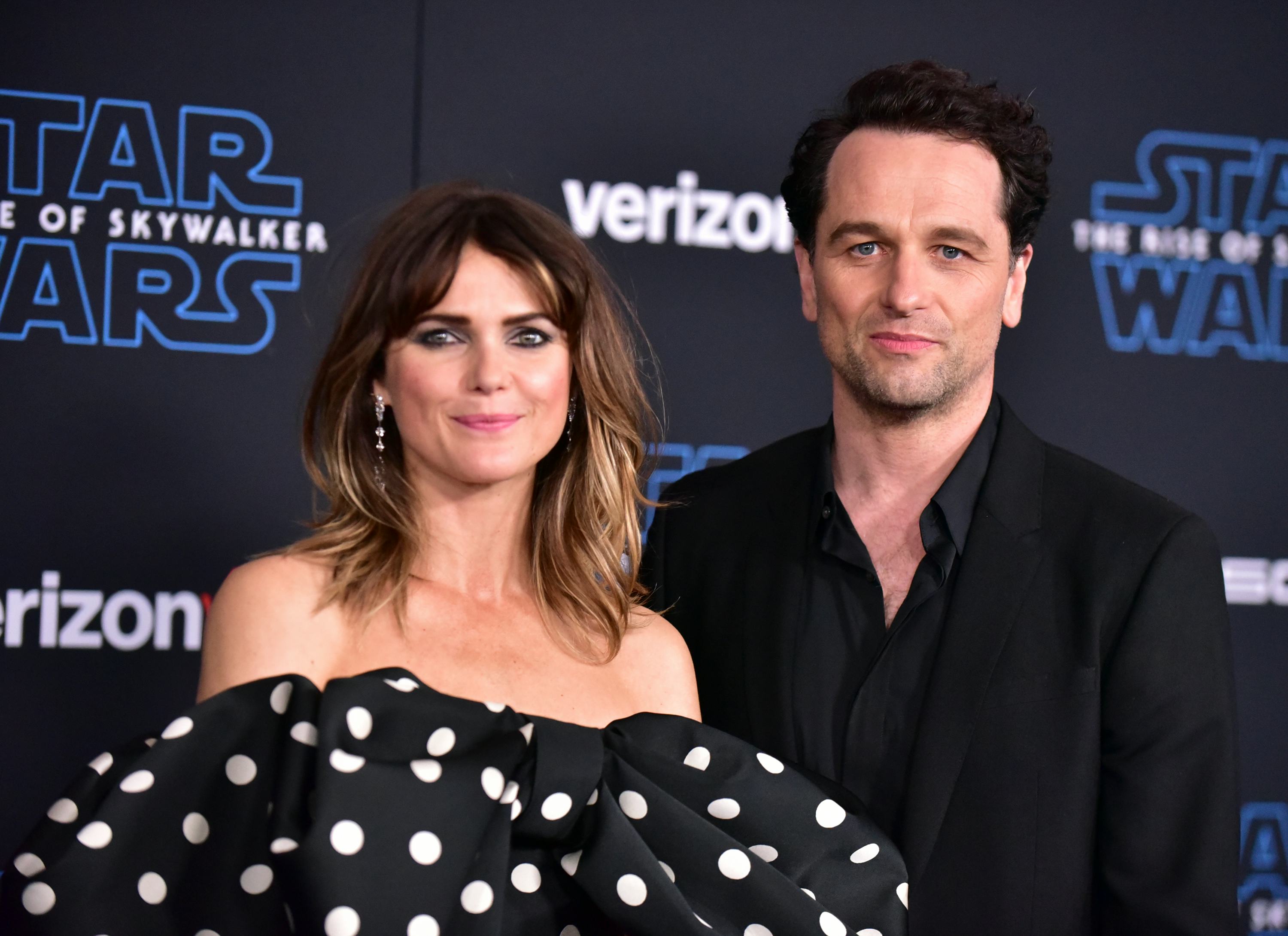 HOLLYWOOD, CALIFORNIA - DECEMBER 16: Keri Russell (L) and  Matthew Rhys attend the Premiere of Disne&hellip;