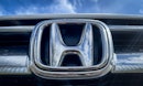 EXETER, UNITED KINGDOM - MARCH 25: Raindrops gather on the logo of the Honda Motor Company on the fr...