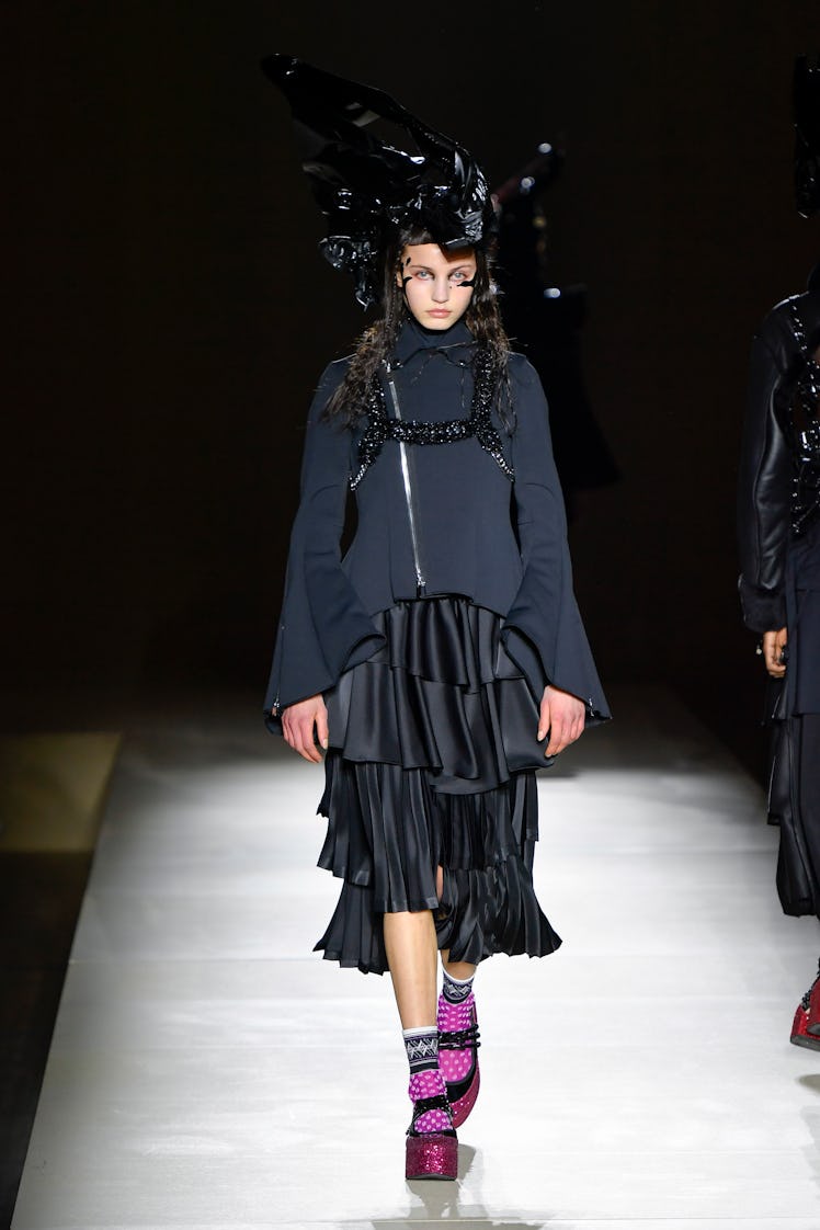 PARIS, FRANCE - MARCH 04: A model walks the runway during the Noir Kei Ninomiya Ready to Wear Fall/W...
