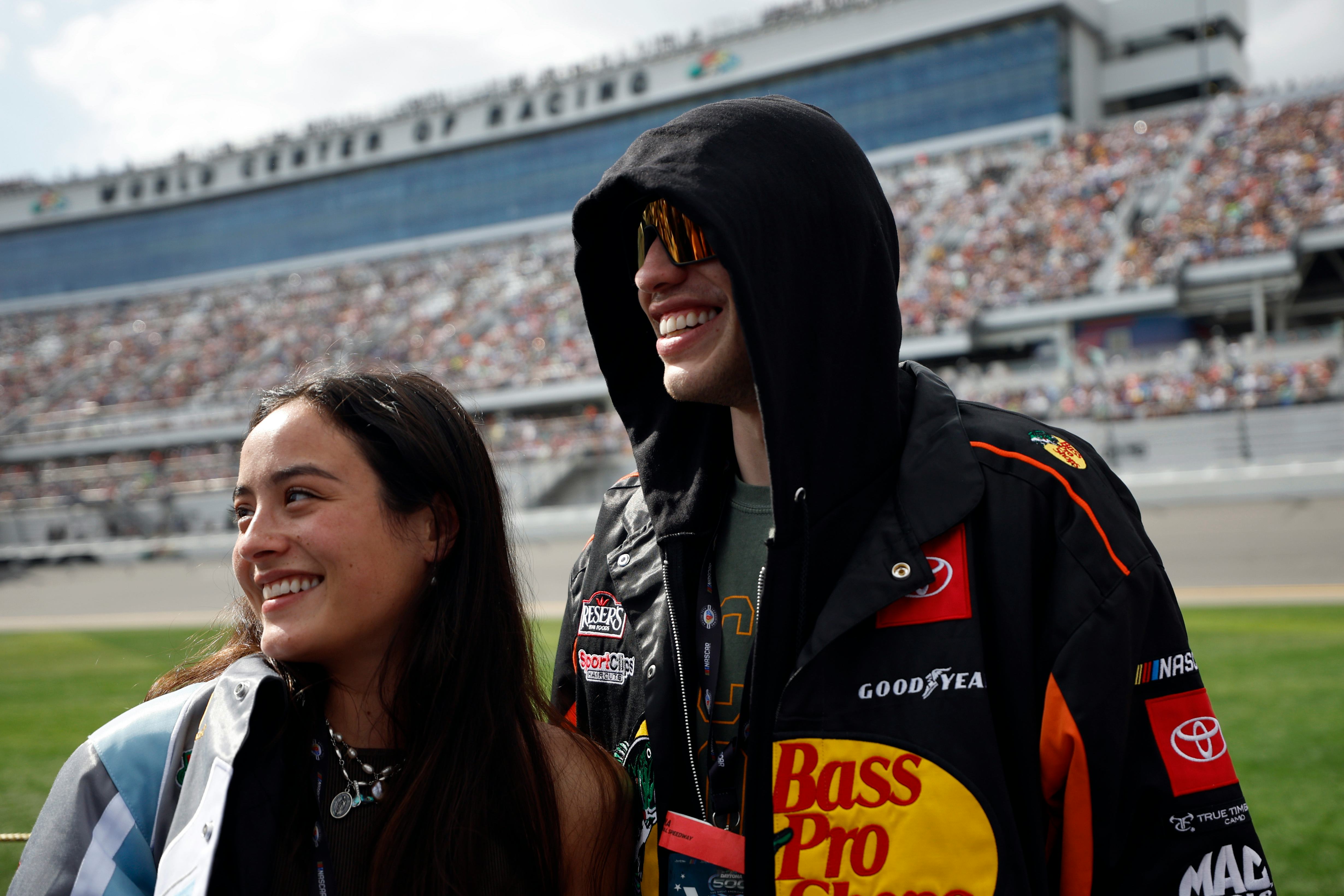 Pete Davidson and Chase Sui wait on the grid prior to the NASCAR Cup Series 65th Annual Daytona 500 &hellip;