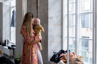 Danish model Caroline Brasch Nielsen at the Stine Goya backstage with her baby before Stine Goya sho...