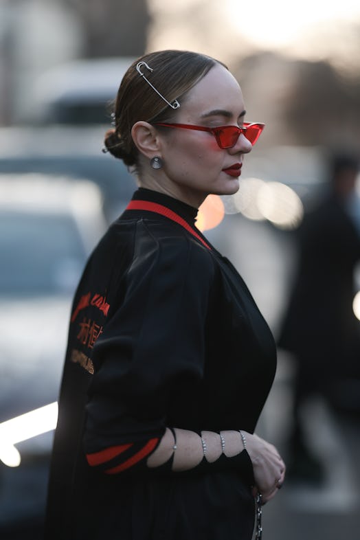 Barrettes are a  Paris Fashion Week Fall/Winter 2023 street style beauty trend.