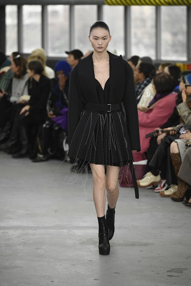 Model on the runway at Sacai Fall 2023 Ready To Wear Fashion Show on March 6, 2023 in Paris, France....