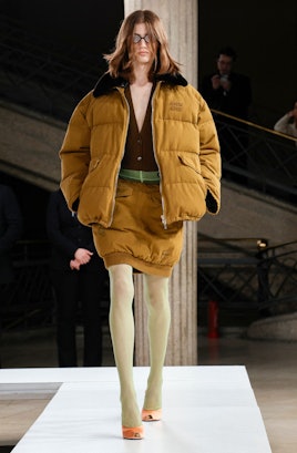 A model presents a creation from Miu Miu Womenswear Fall-Winter 2023-2024 collection during Paris Fa...