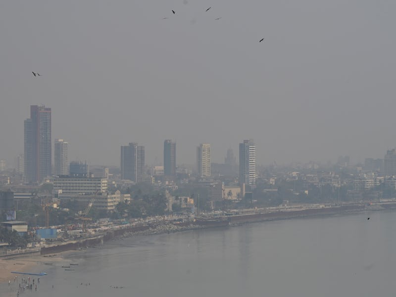 MUMBAI, INDIA - MARCH 4: City skyline engulfed in smog amid hazy weather, at Marine Drive, on March ...