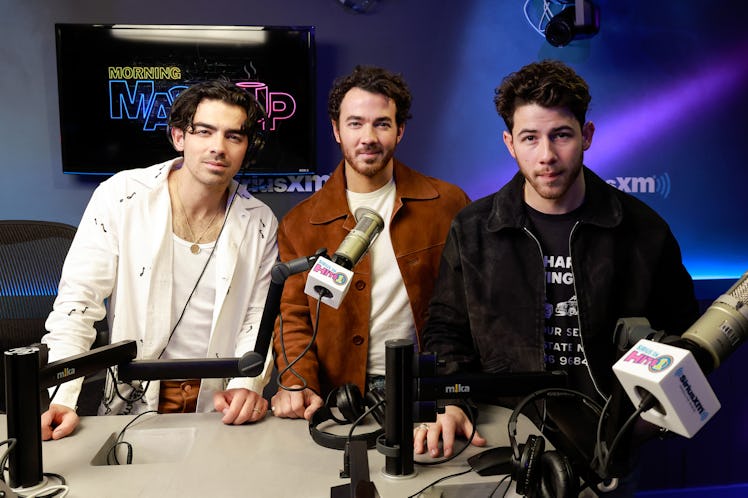 NEW YORK, NEW YORK - APRIL 07: Joe Jonas, Kevin Jonas and Nick Jonas of The Jonas Brothers visits Si...