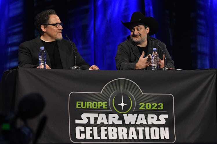 LONDON, ENGLAND - APRIL 08: John Favreau and Dave Filoni onstage during the Ahsoka panel at the Star...