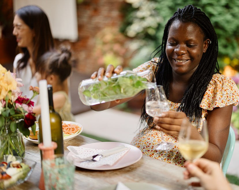 a pregnant person celebrating mother's day