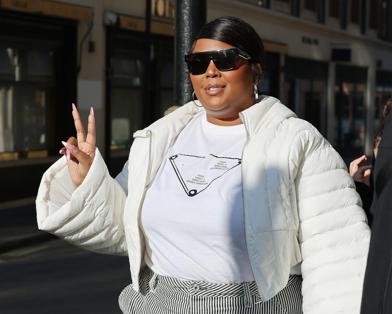 LONDON, ENGLAND - FEBRUARY 13: Lizzo leaving KISS Radio Studios on February 13, 2023 in London, Engl...