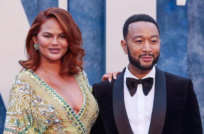 Chrissy Teigen responded to comment about Esti in baby carrier.
