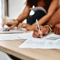 Cropped shot of a couple going over their finances together at home