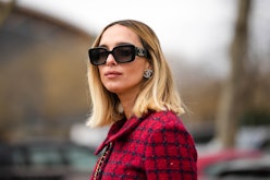 Candela Novembre wears a straight blonde bob and big chanel sunglasses at paris fashion week in marc...