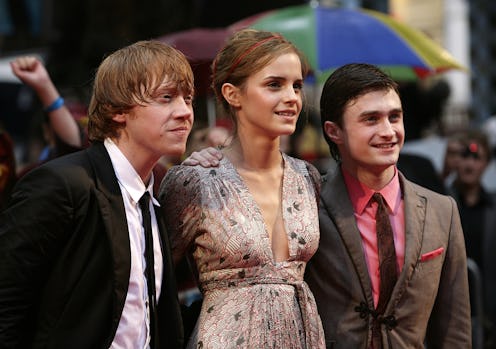 Rupert Grint (left), Emma Watson and Daniel Radcliffe (right) arriving for the world premiere of Har...