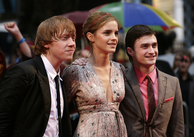 Rupert Grint (left), Emma Watson and Daniel Radcliffe (right) arriving for the world premiere of Har...