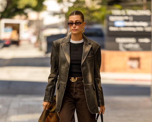 Hailey Bieber ditched her signature glazed donut manicure, and tapped into the breakout "lip gloss" ...