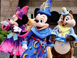 Mickey Mouse (C) and Disney characters greet guests to celebrate the 10th anniversary of Tokyo Disne...