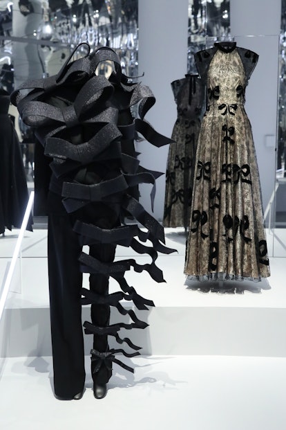 NEW YORK, NEW YORK - OCTOBER 26: Outfits on display at the press preview for the Costume Institute's...
