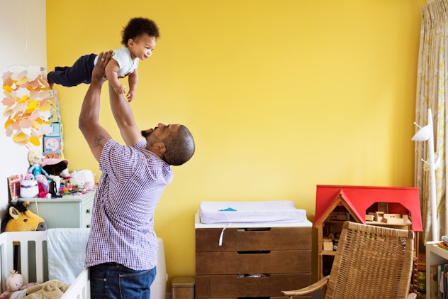 a dad and baby in the baby's room what not to do during a sleep regression