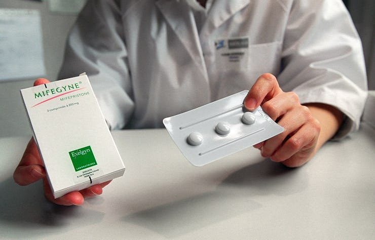 PARIS, FRANCE: A nurse shows a box of the RU486 pill at the family planning department of Hopital B...