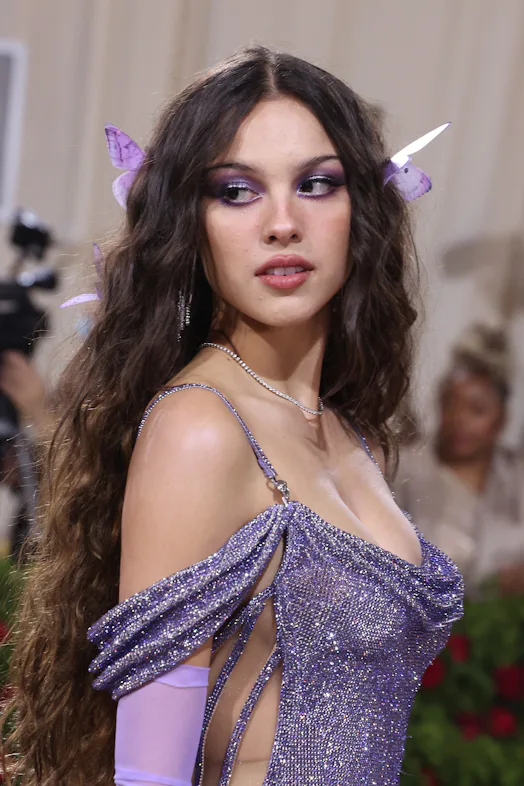 Olivia Rodrigo purple eye makeup and butterfly clip Met Gala 2022