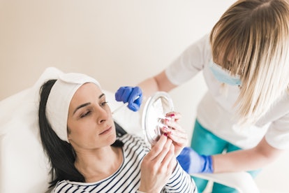 woman receiving prp treatment by a dermatologist