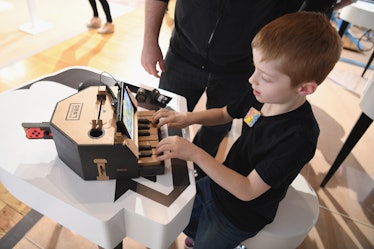 NEW YORK, NY - FEBRUARY 02: In this photo provided by Nintendo of America, kids enjoy playing tunes ...