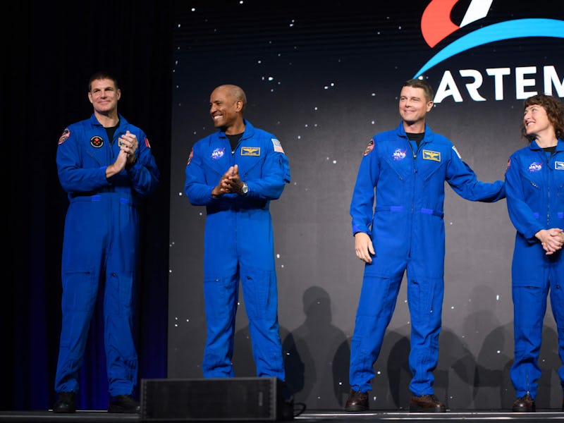 TOPSHOT - (L-R) Astronauts Jeremy Hansen, Victor Glover, Reid Wiseman and Christina Hammock Koch sta...