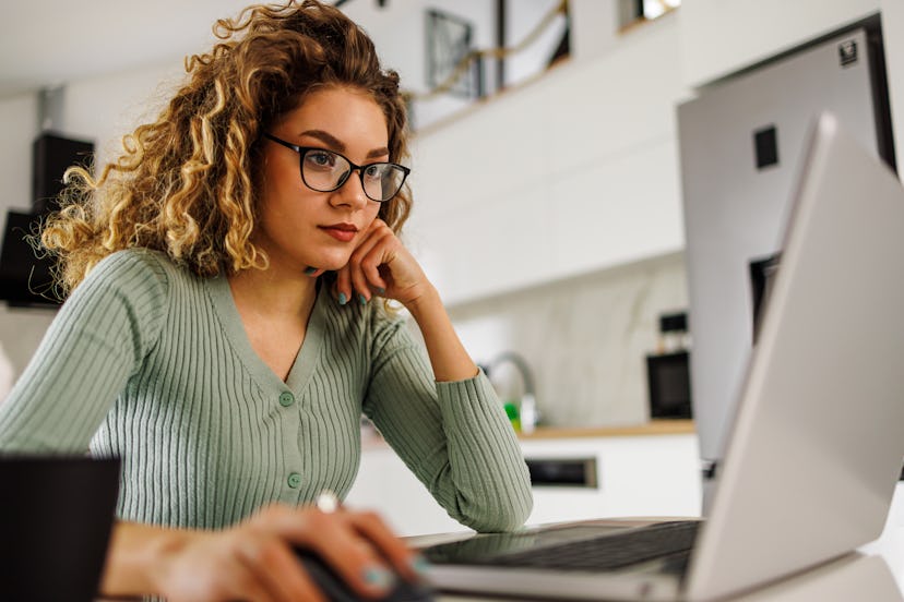 Young woman working online