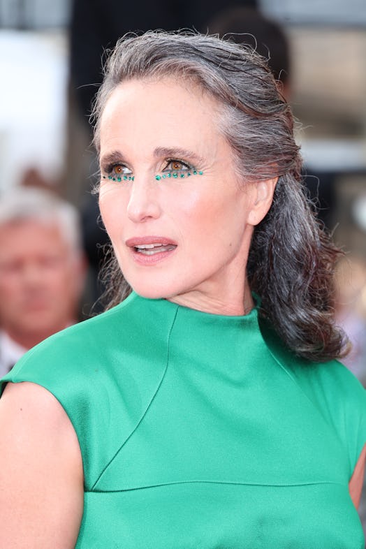 Andie MacDowell wearing green eye gems at the 2022 cannes film festival 