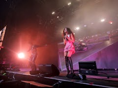 INDIO, CALIFORNIA - APRIL 22: Zendaya (R) performs with Labrinth at the Mojave Tent during the 2023 ...