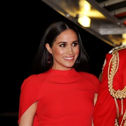 Meghan Markle in red dress and bold blush with Prince Harry 2021