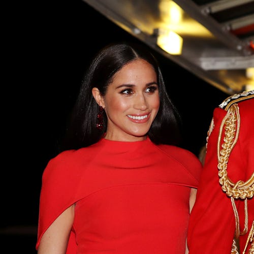 Meghan Markle in red dress and bold blush with Prince Harry 2021