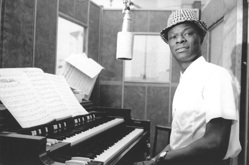 Music baby names inspiration and entertainer Nat "King" Cole records at Capitol Recording Studios in...