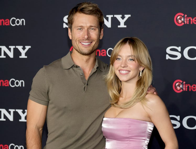 Glen Powell and Sydney Sweeney pose for photos