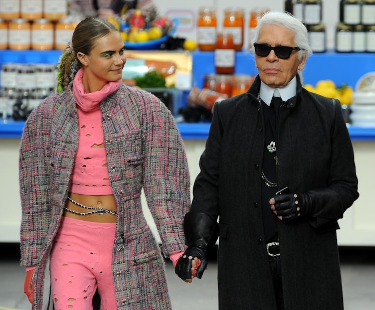 Designer Karl Lagerfeld and model Cara Delevingne 