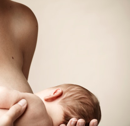 closeup of baby breastfeeding in combination feeding guide for new parents