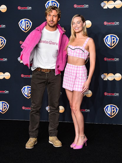Margot Robbie and Ryan Gosling at CinemaCon 2023 for Barbie Movie with blonde highlights