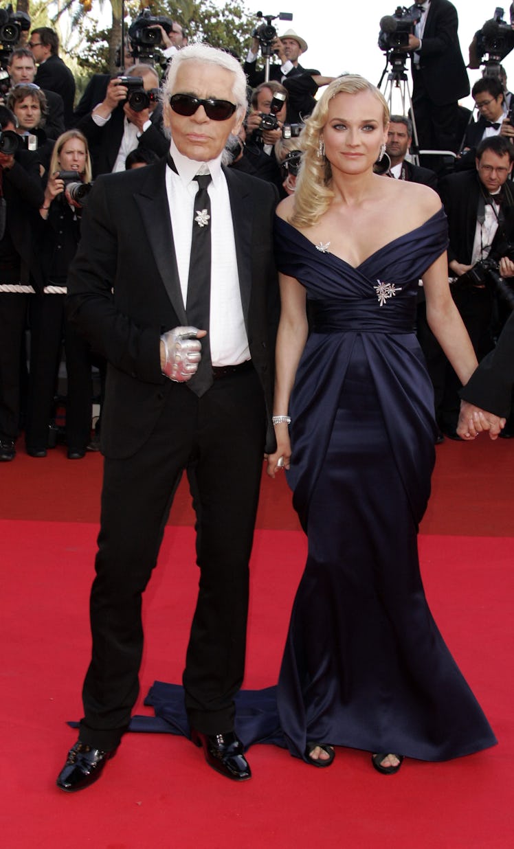 Diane Kruger and Karl Lagerfeld (Photo by Jean Baptiste Lacroix/WireImage)