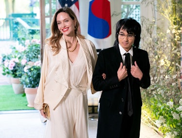 TOPSHOT - US actress Angelina Jolie and son Maddox arrive for the State Dinner in honor of South Kor...