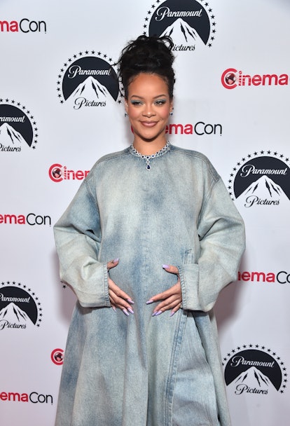 LAS VEGAS, NEVADA - APRIL 27: Rihanna poses for photos, promoting the upcoming film "The Smurfs Movi...