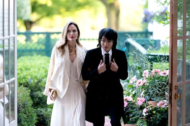 Angelina Jolie (L) and her son Maddox arrive for a State Dinner 