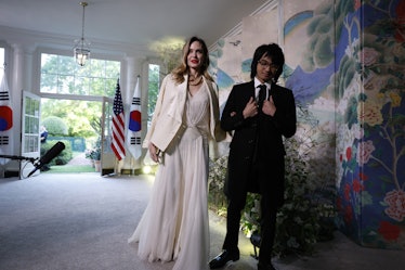Angelina Jolie and her son Maddox arrive for the White House state dinner