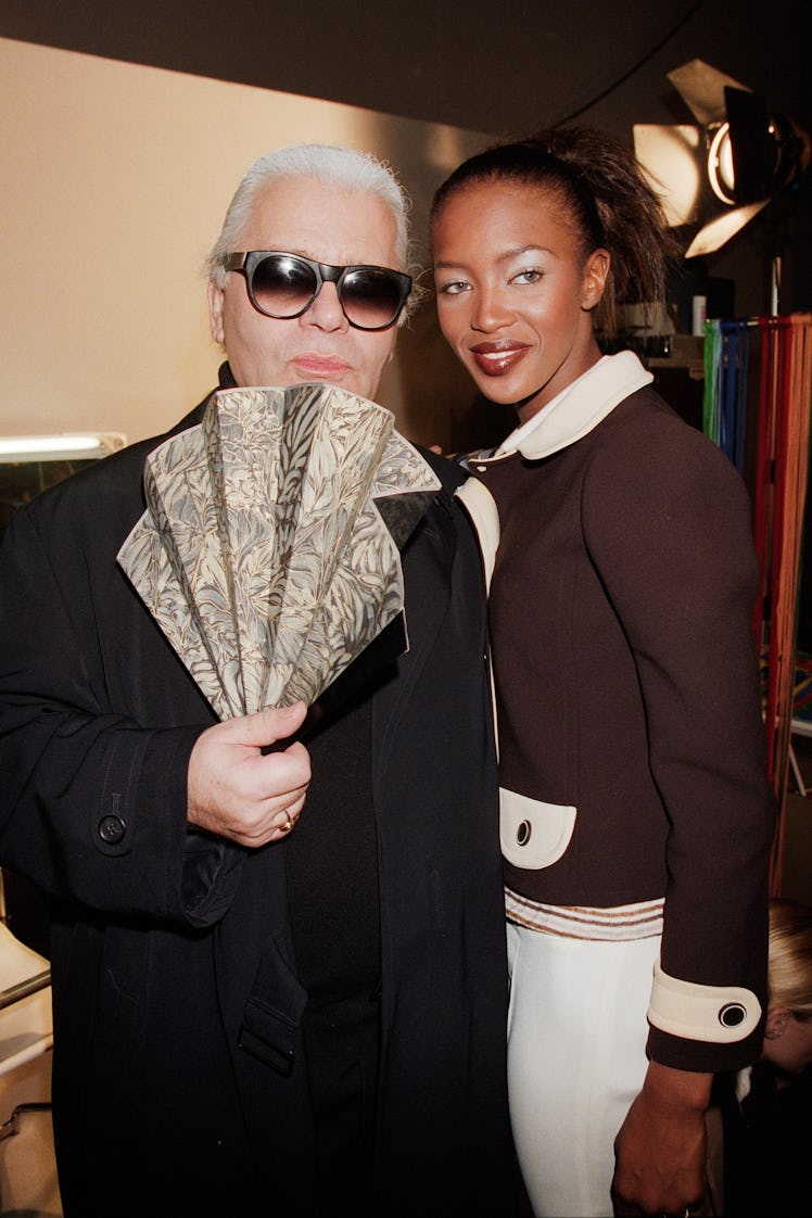 Fashion designer Karl Lagerfeld and model Naomi Campbell pose a\