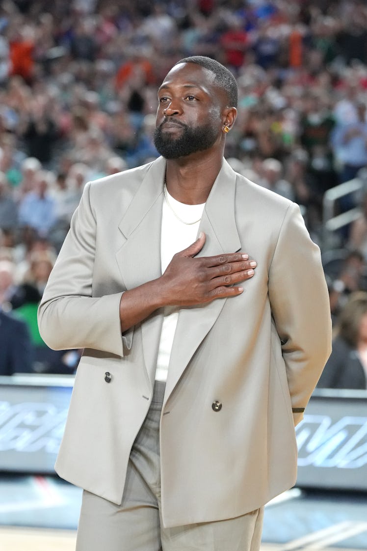 NBA player Dwayne Wade is recognized at half time as new inductee to the Naismith basketball Hall Of...