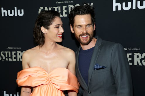 LOS ANGELES, CALIFORNIA - OCTOBER 14: Lizzy Caplan and Tom Riley attend the premiere of Hulu's "Cas...