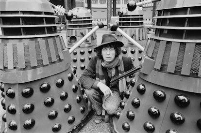 English actor Tom Baker as the 'Doctor' with Daleks on the set of British television series 'Doctor ...